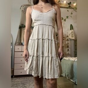 cream colored, tiered spaghetti strap dress